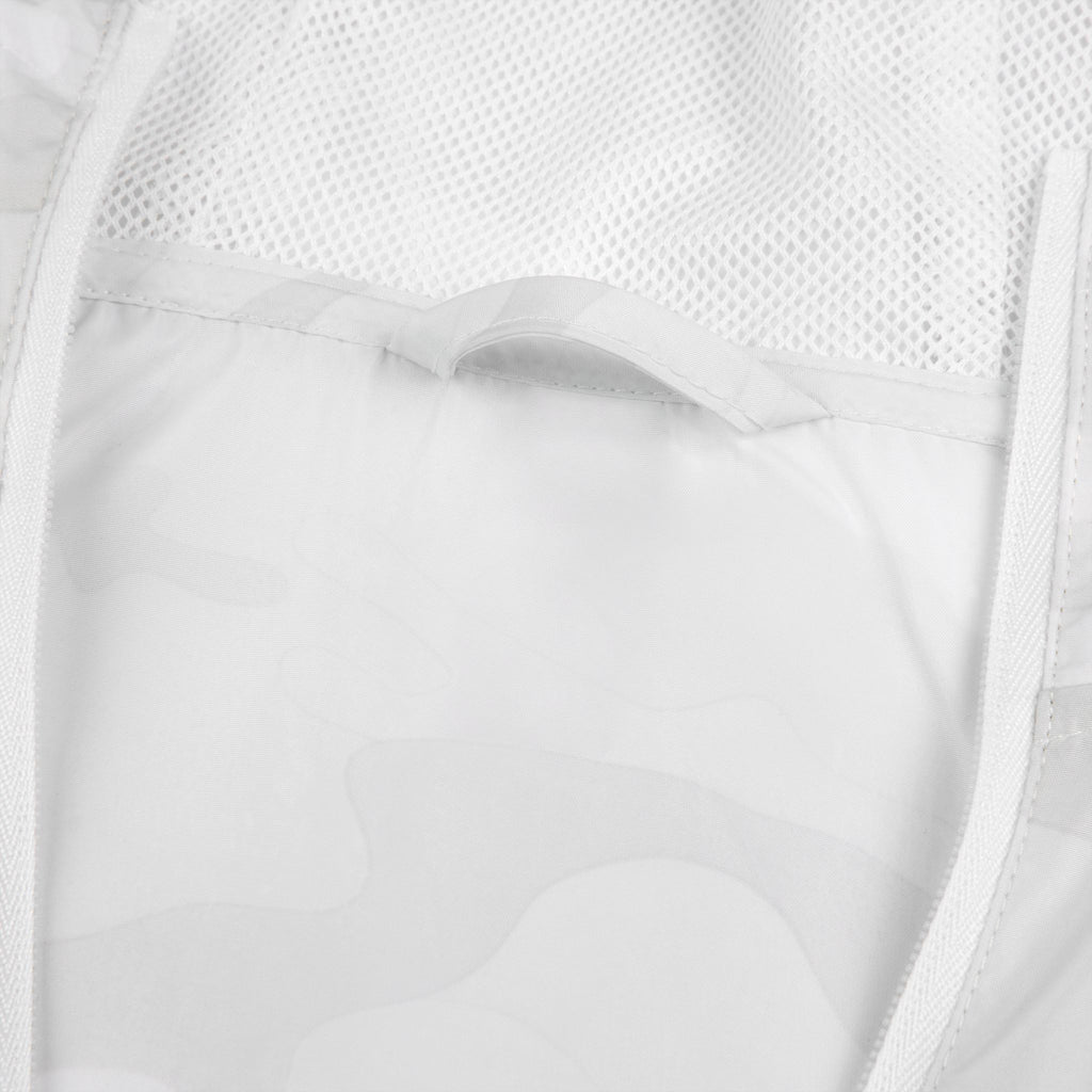 Close-up of white windbreaker jacket fabric